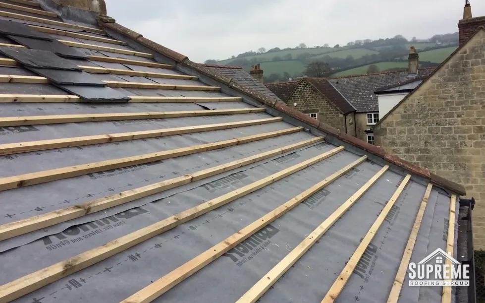 New timber battens fixed over grey breathable membrane on a pitched roof